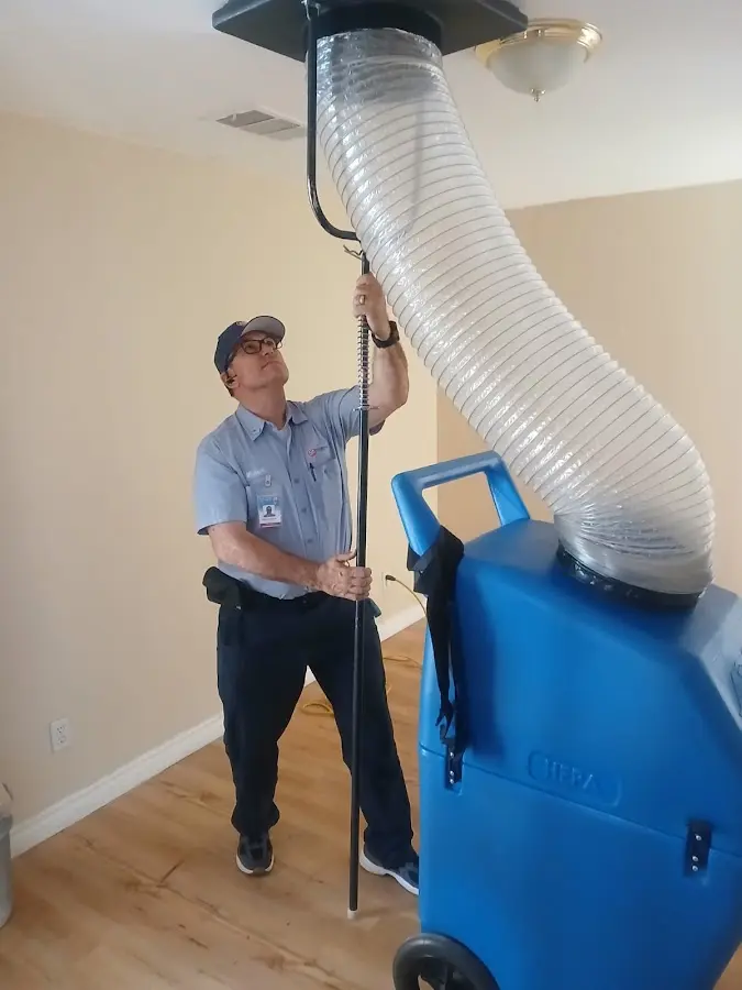 Mini Split Installation technician using HEPA equipment in Erie